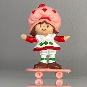 Vintage Strawberry Shortcake on Skateboard PVC Figurine, 1982